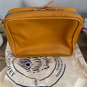 Blair Ritchey Ginger Ber with bright blue zipper